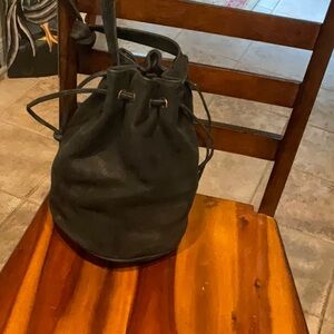I Awesome Carla Machi black suede leather barrel bag